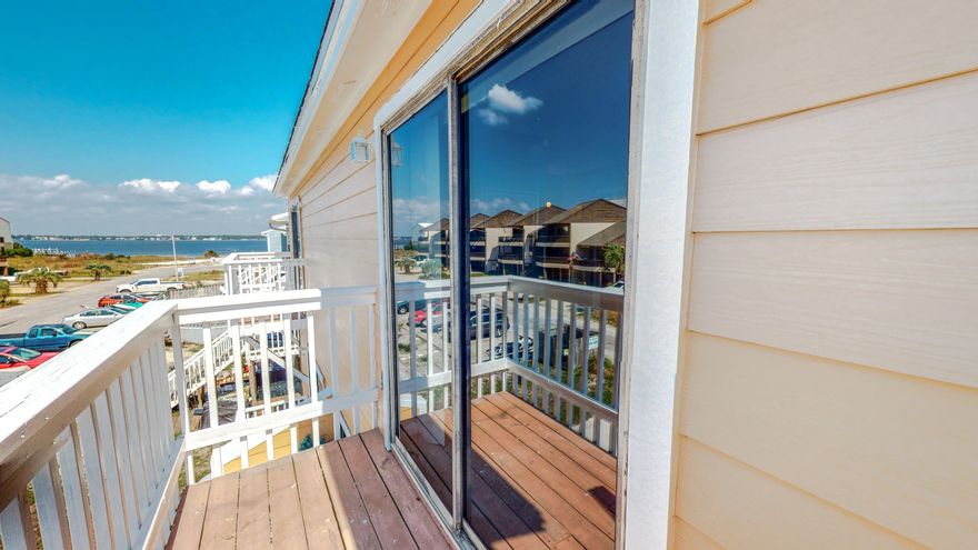 NO DAMAGE from the hurricane! Seller has replaced the roof and all new hardiboard siding.... An Incredible opportunity to purchase a townhome (or duplex- the other side is for sale too) on Navarre Beach! Short Term rentals are accepted and offers a great location with easy access to the beach. The first floor has a bedroom and bath, washer and dryer located off the kitchen, and the master is on the 2nd floor with a loft area. The townhome is built on pilings so under unit parking available with a storage unit.