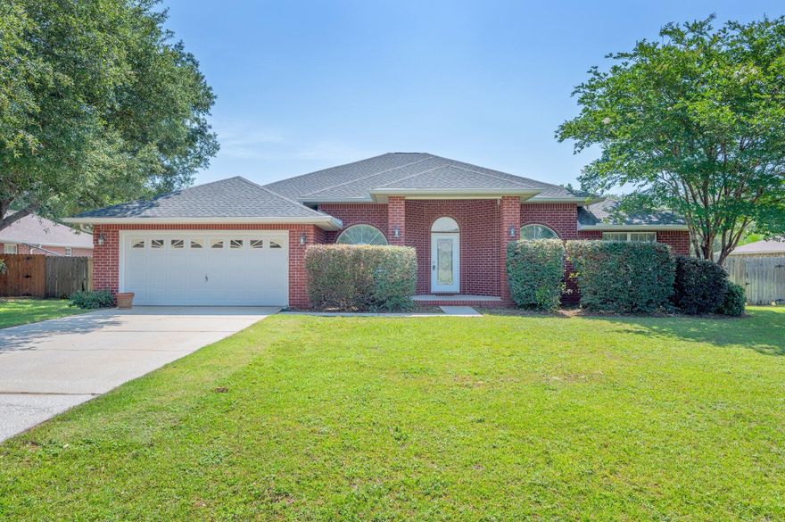 Welcome to this beautiful 4 bedroom, 3 bathroom home located in Navarre. This spacious house features an open and bright layout, perfect for entertaining guests or relaxing with family. Great gourmet kitchen is equipped with a double oven, ideal for cooking delicious meals and  loads of counter space! The garden tub in the bathroom provides a luxurious spot to unwind after a long day. With walk-in closets in each bedroom, there is plenty of storage space for all your belongings. HOA fees are paid by owner. This fine home is conveniently located for easy access to beaches, shopping and great restaurants as well as Pensacola and Ft. Walton Beach! . Don't miss out on the opportunity to make this house your new home!