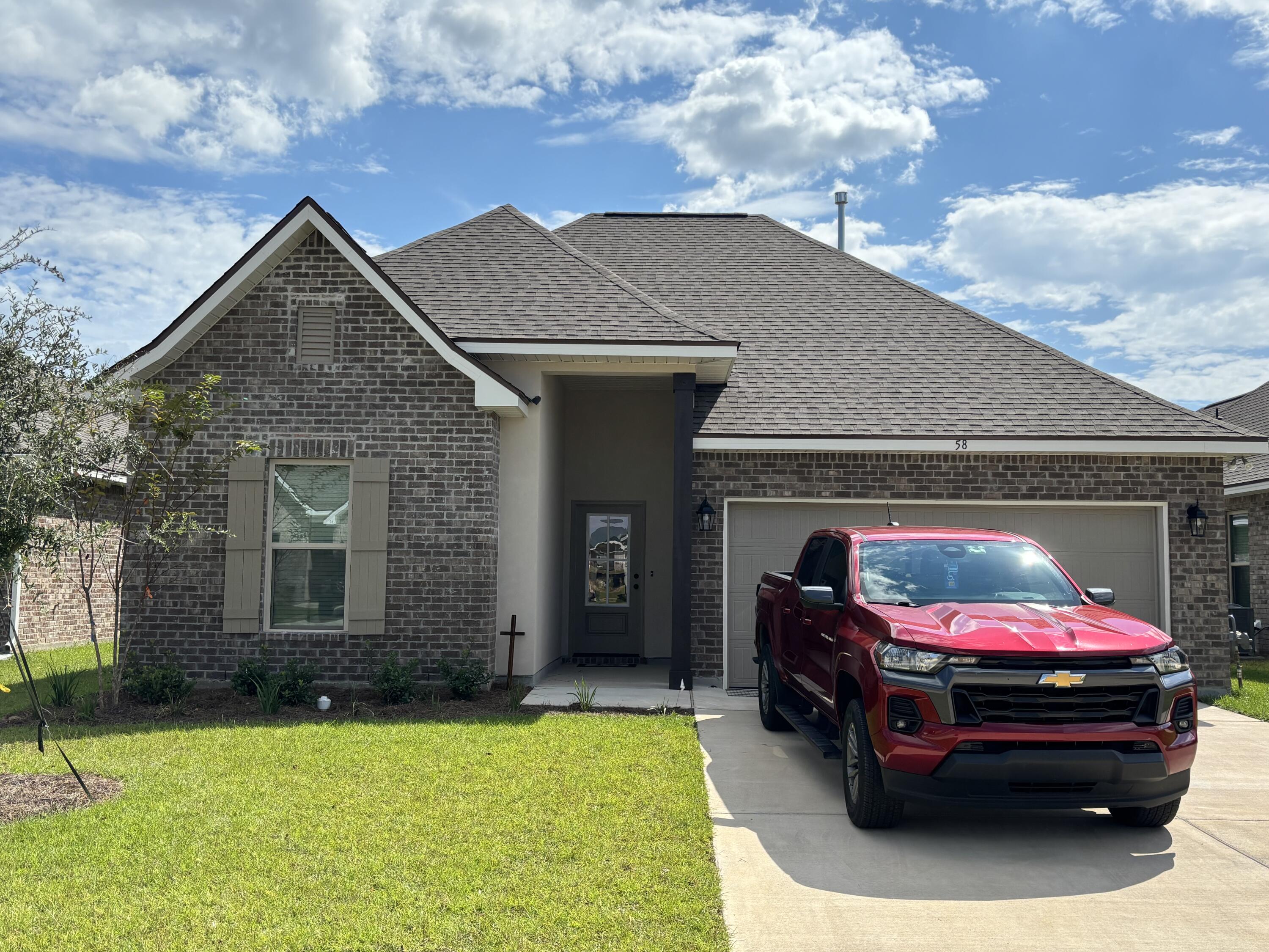 Awesome builder rate plus FREE front gutters. Restrictions apply.The TRILLIUM IV B in The Bluffs at Lafayette community offers a 3 bedroom, 2 full bathroom, open and split design. Upgrades added (list attached). Special Features: double vanity, garden tub, separate shower, and walk-in closet in master bath, kitchen island, walk-in pantry, boot bench in mudroom, covered porches, undermount sinks, LED lighting throughout, recessed lighting, crown molding, ceiling fans in living and master, custom framed mirrors in all baths, smoke and carbon monoxide detectors, landscaping, architectural 30-year shingles, flood lights, and more! Energy Efficient Features: tankless gas water heater, kitchen appliance package with gas range, vinyl low E windows, and more! Energy Star Partner.