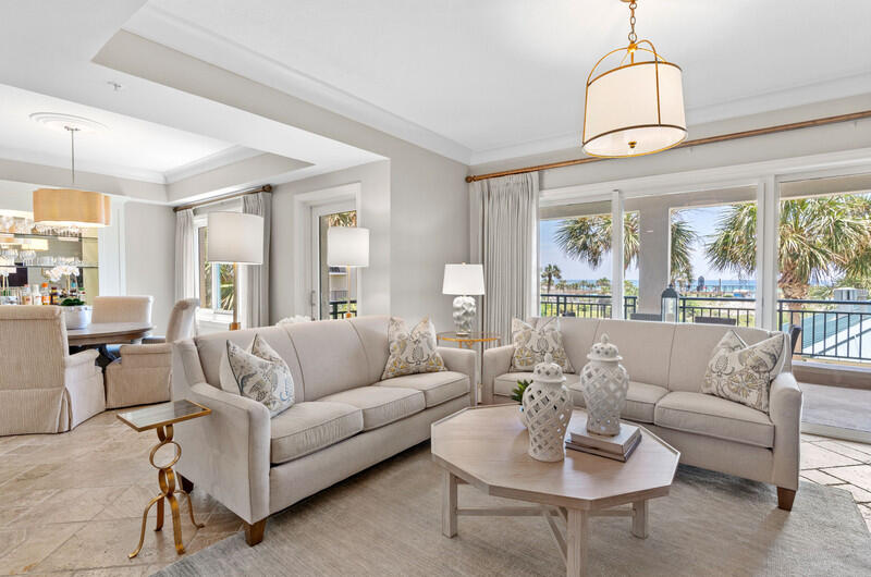 This property feels more like a home than a condo! This beautifully decorated condo is located in an upscale, non-rental building, offering a unique blend of elegance and comfort. Renovations all high end including kitchen cabinets, remodeled bathrooms, paint, shiplap, light fixtures, wine bar, ice maker, wine cooler, washer/dryer and more! All living/dining/kitchen and gulf front balcony are walk-in floor level. The balcony is perfect, quiet, private and serene. Just a few steps away from the beautiful pool. All furnishings convey with sale. Access to 3 championship golf courses, 1 private golf course, 15 world-class tennis courts, pickleball, a 226-slip marina, a fitness center, spa. Experience the convenience of nearby shopping and dining, all accessible by golf carts. Plus, take advantage of the marina for all your boating needs.
Sandestin Golf and Beach Resort features more than seven miles of beaches and pristine bay front. Shop, dine and play at the charming pedestrian village, The Village of Baytowne Wharf and more. Inside the gates of the resort, residents enjoy a balanced lifestyle of high-class living, spanning the 2,400 acres from the beach to the bay. Everything within the gates of the resort is accessible by golf cart or bicycle. The entire resort is interconnected by miles of pedestrian, bike and golf cart paths that weave through groves of live oaks, meandering past natural lagoons, fountains, man-made lakes, and meticulously landscaped fairways.