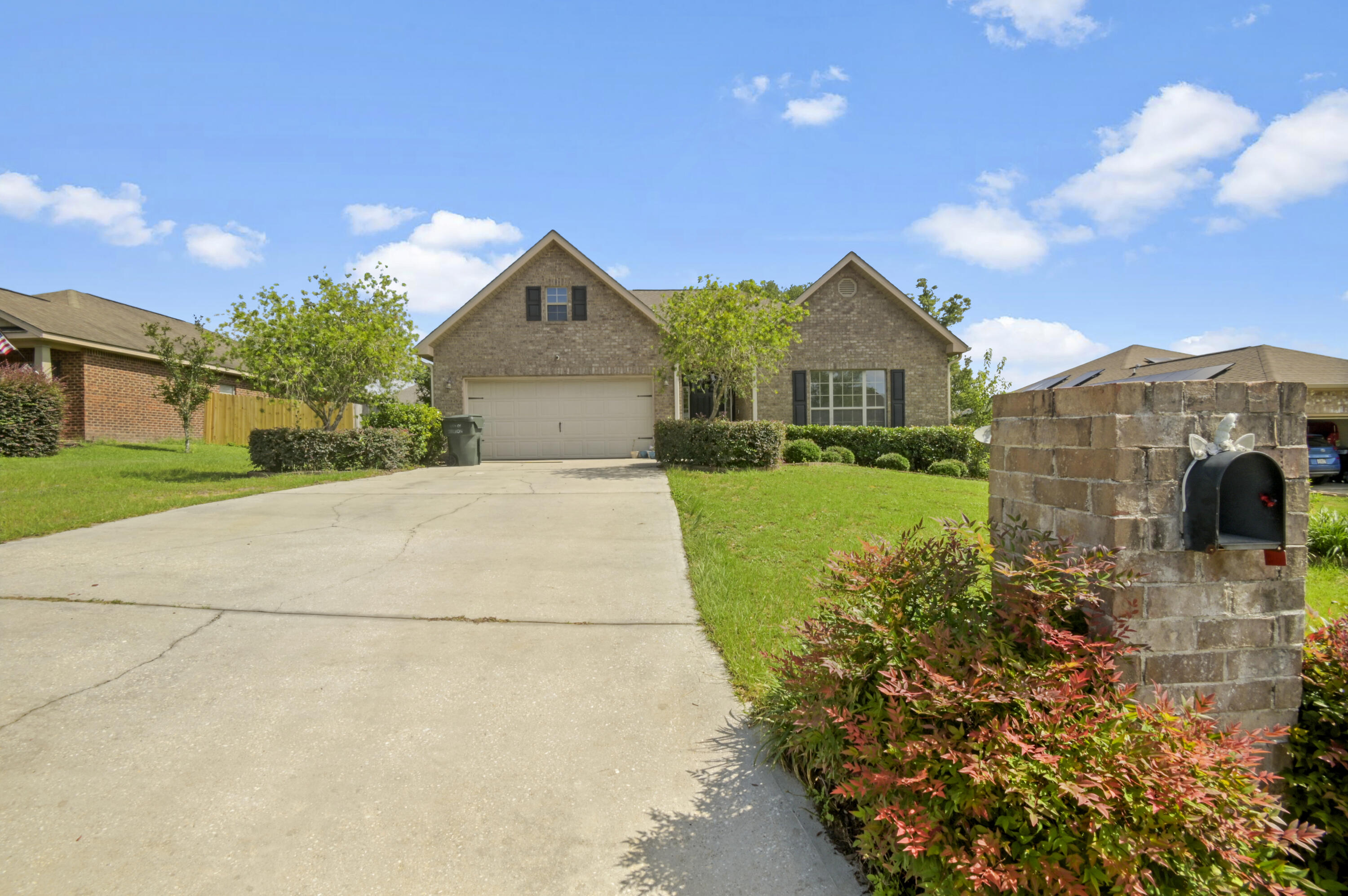 Welcome to your new beautifully updated Milton home in the sought after Rustic Ridge Estates neighborhood. This lovely residence is set in a prime location with convenient access to Whiting Field, Interstate 10, shopping centers, schools, beaches, and Blackwater State Park. Upon entering, you're greeted by a spacious foyer leading to the heart of the home - an open plan great room, kitchen, and dining area ideal for family activities and entertaining. The kitchen features stainless-steel appliances, built in microwave, deep stainlessglass sink, tile backsplash and a breakfast bar while the great room showcases a lofty 13' vaulted ceiling giving you a sense of openess.