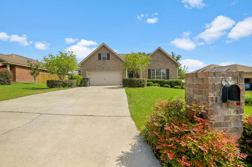 Welcome to your new beautifully updated Milton home in the sought after Rustic Ridge Estates neighborhood. This lovely residence is set in a prime location with convenient access to Whiting Field, Interstate 10, shopping centers, schools, beaches, and Blackwater State Park.  Upon entering, you're greeted by a spacious foyer leading to the heart of the home - an open plan great room, kitchen, and dining area ideal for family activities and entertaining. The kitchen features stainless-steel appliances, built in microwave, deep stainlessglass sink, tile backsplash and a breakfast bar while the great room showcases a lofty 13' vaulted ceiling giving you a sense of openess.