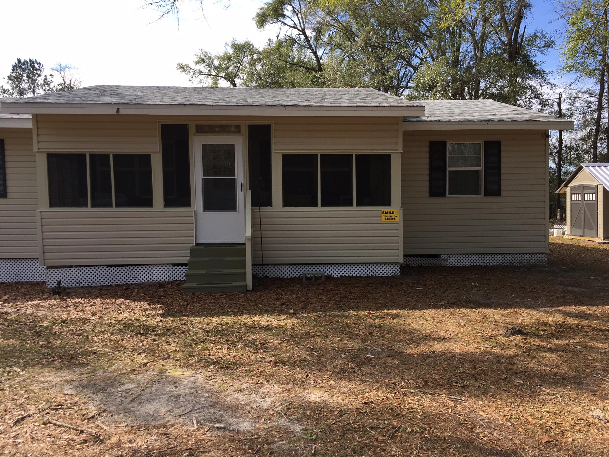 NEWLY REMODELED AND IN LIKE NEW CONDITION - A REAL JEWEL IN A GREAT NEIGHBORHOOD THIS IS A VERY WELL PRICED 4 BR / 2 BA HOME ON 5 ACRES THIS IS A MUST SEE - LOTS OF CARE HAS BEEN TAKEN IN THIS REMODEL SO YOU GET A ''LIKE NEW'' HOME - HARDWOOD FLOORING, NEW CARPET IN BEDROOMS - DINING AREA IN KITCHEN, LIVING ROOM, FAMILY ROOM, TWO EXTRA ROOMS FOR YOUR DESIGNATION - BUILT IN TV AREA ALL DONE WITH GREAT TASTE AND SKILL. MAKE AN APPOINTMENT FOR A RIVATE SHOWING OF THIS RARE FIND.