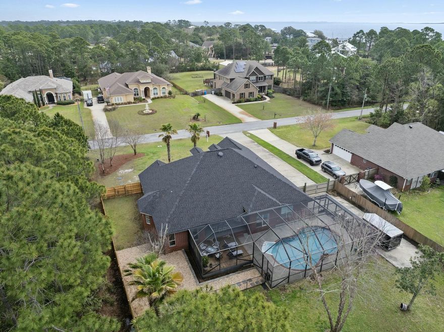 Nestled in a serene neighborhood, this exquisite 4-bedroom, 3-bathroom home is a harmonious blend of elegance and comfort. From the moment you step inside, you're greeted by a spacious open floor plan that seamlessly connects the living, dining, and kitchen areas, making it ideal for both family gatherings and entertaining guests. The gourmet kitchen, featuring modern appliances and ample counter space, is a culinary enthusiast's delight. Each bedroom offers generous space and natural light, with the master suite boasting a private bath for a touch of luxury. The additional bathrooms are tastefully designed with contemporary fixtures. Step outside to discover your private oasis a sparkling pool surrounded by a beautifully landscaped yard, perfect for relaxing or hosting summer barbecues.