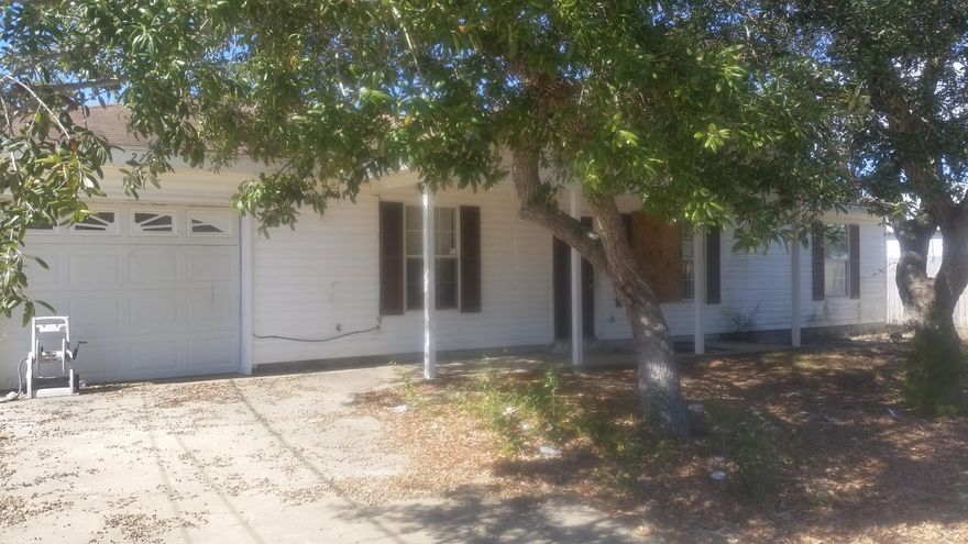 Short Sale. Needs work. Call agent for additional details. Investor special.