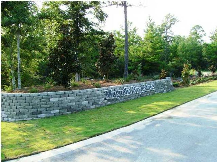 BANK OWNED LOT IN MAGNOLIA BAY ESTATES IS A SECLUDED COMMUNITY ON GOODWIN CREEK. CITY WATER, SEWER AND UNDERGROUND UTILITIES ARE AVAILABLE. PRIVATE BOARD WALK TO GOODWIN CREEK. BAYLOOP ROAD HAS BEEN WIDENED AND PAVED. GOODWIN CREEK GOES OUT TO ALAQUA BAYOU AND THEN TO CHOCTAWHATCHEE BAY. AN 8' WIDE BIKE PATH THAT GOES ALL AROUND BAYLOOP ROAD. A LITTLE LEAGUE PARK IS NOW IN OPERATION IN HAMMACK BAY. ENJOY THE FEELING OF OLD FLORIDA LIKE IT USED TO BE IN MAGNOLIA BAY ESTATES. ARCHITECTURAL THEME OF MAGNOLIA BAY ESTATES IS NEW ORLEANS STYLE HOMES, PLANTATION WITH LARGE PORCHES, MINIMUM SQ FT IS 1800. MAIN ENTRANCE IS COMPLETE WITH SIGNAGE. MAGNOLIA BAY IS SERENE AND A GETAWAY FEEL FROM THE REST OF THE WORLD.