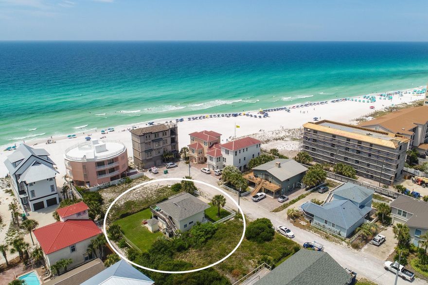 Extraordinary coastal positioning with excellent beach proximity juxtaposed beautiful gulf views create an ideal setting for this traditional family escape. +$42,000 in projected gross annual rental income; this property boasts a 70x110 lot size complete with deeded beach access and a recently renovated home. The open floor plan is characterized by exceptional views from the southern positioning of the structure. The first level features two large bedrooms, covered carport, spacious full bathroom and large storage closet. The second level is wide open with a spacious living / dining room, full kitchen and loft style sleeping areas complete with a second full bathroom. This private location is tucked away in an exclusive corridor South of Scenic 98 with great proximity to world class