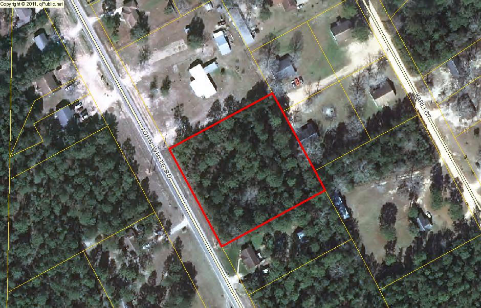 1.9 acre home site south of I-10! Wooded. Paved road frontage. Easy access to the beaches of South Walton. Priced to sell!