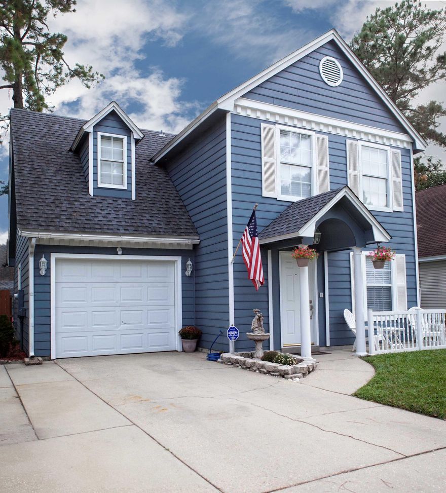 Prepare to be impressed! This home reflects what both quality and upgrades that are rarely available for this price! Its Cape Cod design supplies the pallet for a decorator's dream yardbeautiful folliage, brick-paver walks and plant beds, landscape lighting, and a large screened porch for relaxation and casual entertaining. This yard gives the feel of a tropical oasis that you will find lots of excuses to enjoy. The living area offers a wood-burning fireplace, lots of windows and large crown molding and is adjacent to a delightful kitchen with white cabinetry, smooth-surface range/oven, built-in microwave/hood, dishwasher, disposal plus wonderful pantry spaceand sliding-glass doors open directly to the screened porch!