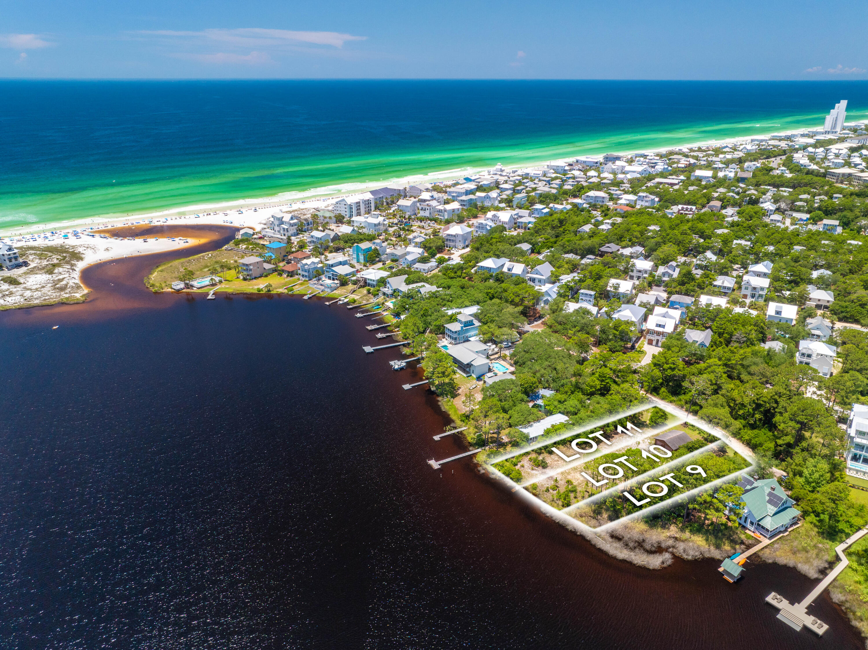 An unparalleled opportunity to own a coveted waterfront lot on Eastern Lake, one of 30A's rare coastal dune lakes where freshwater meets the Gulf. Tucked away amongst lush landscape with panoramic lake and Gulf views, this generous 50'x196' lot presents endless opportunities for crafting a custom coastal retreat or high-performing luxury investment property in the heart of Seagrove Beach. With 50ft of waterfront, enjoy effortless Gulf access--launch your paddleboard, kayak, or boat from your future private dock, or take a short stroll to the nearby beach access. Nestled within the natural beauty of Eastern Lake, this exclusive and rare lot is the perfect mix of privacy, picturesque views, and investment potential. Seller can provide financing options for lot purchase and construction loan. Living lakefront on Eastern Lake in Seagrove Beach offers a rare blend of captivating surroundings, recreation, and exclusivity - where the tranquility of a coastal dune lake meets the best of the 30A lifestyle. Located along the eastern corridor of Scenic Highway 30A, Seagrove Beach places you in the heart of it all, with easy access to the charm of Seaside, the energy of Rosemary Beach, the timeless elegance of Alys Beach, and the boutiques, dining, and entertainment found throughout WaterColor and Grayton Beach. From boating or paddleboarding straight from your backyard to catching Gulf sunsets from your future private dock, this location delivers an unparalleled waterfront experience. Here, peaceful mornings on the lake effortlessly transition into afternoons exploring vibrant beach towns, each offering its own blend of luxury, leisure, and lifestyle. Whether you're envisioning a full-time residence, a vacation retreat, or an investment opportunity, this property combines lasting value with exceptional development potential. Inquire today to experience it firsthand and secure this highly sought-after location along the shores of 30A's rare coastal dune lakes - your coastal sanctuary south of 30A starts here!