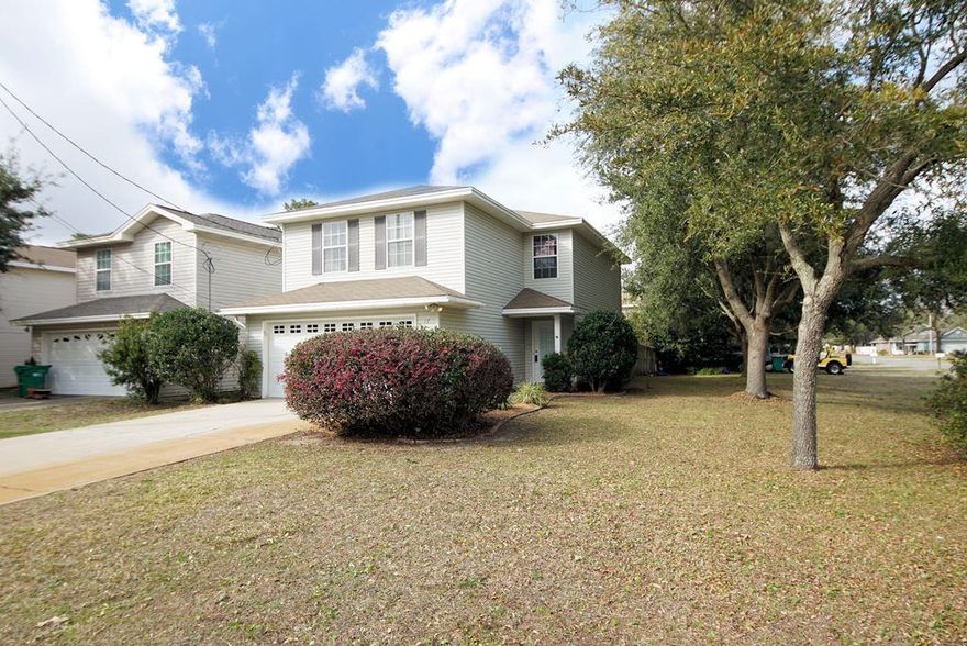 Shalimar home that is freshly painted and move in ready, conveniently located close to both bases as well as the gorgeous beaches of the Emerald Coast! This ''Shalimar Cottage'' home is part of a thoughtfully planned 29-lot subdivision where each home has access to a pretty, tree shaded private community park with a lovely walking path. Virtually maintenance free, this vinyl home also has a fenced yard and a community sprinkler system. The open floor plan features a kitchen that is open to a great room with large sliding glass doors that let in lots of natural light. The kitchen features a built-in microwave, glass top range, refrigerator and breakfast bar. This FOUR bedroom home features a roomy master bedroom with a private bathroom offering a dual sink vanity. The additional upstairs bedrooms share another full bath and there is a convenient powder room downstairs as well. This home also offers an inside laundry room as well as a 2-car garage with an auto opener. Live in the heart of Shalimar and be close to both bases as well as shopping and dining. Homes in this area do not come on the market soon so move quickly and call this one your own!