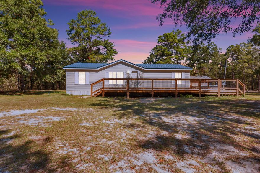 Country Living minutes away from the Beaches and Freeport!Discover this beautifully updated home situated on 5 acres of partially cleared land, offering privacy, space, and endless potential. The property features a brand new deck overlooking a large above-ground pool, perfect for enjoying Florida's outdoor lifestyle.Recent upgrades include an abundance of interior renovations, ensuring move-in readiness and peace of mind. The land offers both open and wooded areas--ideal for recreation, gardening, or future expansion.Conveniently located near the rapidly growing town of Freeport and just a short drive to the Emerald Coast's beautiful beaches, this property combines the best of country living with easy access to shopping, dining, and coastal amenities