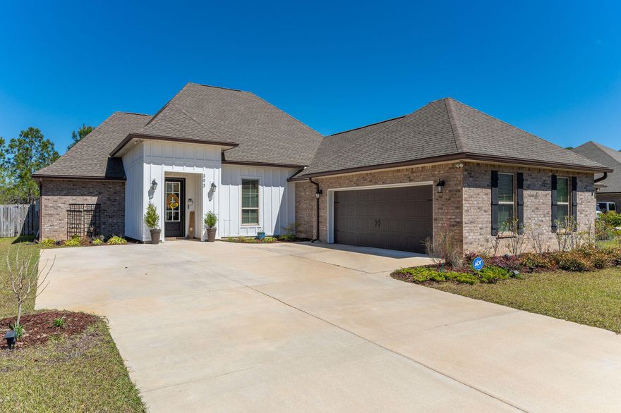 ASSUMABLE 2.5% VA LOAN for eligible buyers!  Avoid the headaches of living in a construction zone and settle right into this gorgeous 2022-built home situated on a spacious, fully-fenced 1/3 acre lot in the construction-complete neighborhood of The Trails at Hammock Bay. The popular Claudet III G floor plan offers 4 bedrooms, 3 full baths, a flexible office/formal dining space, and an open concept living, kitchen, and dining area with soaring 10 foot ceilings. Unexpected extras include a walk-in pantry, separate laundry room, built-in drop zone, covered rear patio, an oversized courtyard entry garage, and tons of storage! Discover quality finishes like quartz counters and wood-look tile, as well as a tankless water heater, bronze plumbing fixtures, and natural gas cooktop. Ideally located  just 1.1 miles to Highway 20 and 1.9 miles to Hammock Bay's original Town Center featuring a fully stocked General Store, microbrewery, food truck court, and amphitheater, not to mention the community pool complex, playgrounds, 10,000 square foot fitness center, basketball court, tennis and pickleball courts!!! Hammock Bay offers an unparalleled resort-style quality of life that now extends all the way to Choctawhatchee Bay with the Bay Club at Steamboat Landing, a waterfront destination with clubhouse, enclosed porch, and extensive pier. 
 