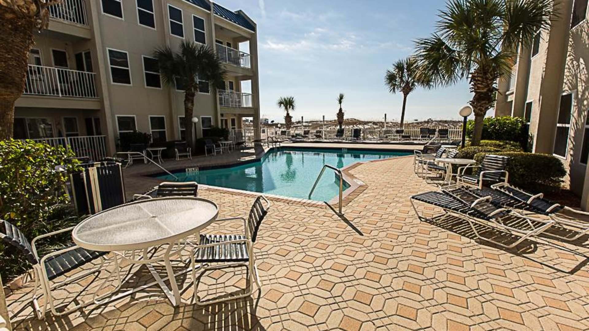 POOLSIDE VILLAS CONDO - Residential