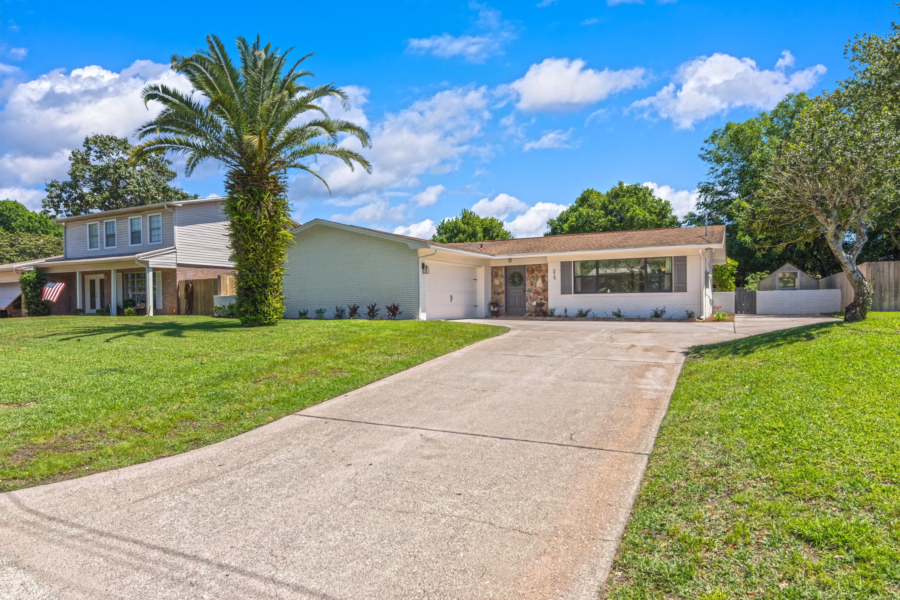 Beautifully renovated home with mid century feel located on a highly desirable street in the center of Fort Walton Beach. This 3 bedroom, 2 bath, 1724 sq ft home features beautifully refinished original hardwood parquet floors in a whitewash oil finish with cement tile in the kitchen & den. Two living spaces allow room for the entire family to spread out. There is a large 2 car garage with a brand new garage door. Updates include all new electrical to include a rewire new service panels inside and out(2020),updated plumbing and all new plumbing fixtures(2019), new water heater(2020), new Kitchen(2020) New Dimensional Shingle Roof(2004), New AC/furnace(2020), New garage doors(2020), new windows & glass door in the main living areas (2019) and newer windows in the rest of the home,