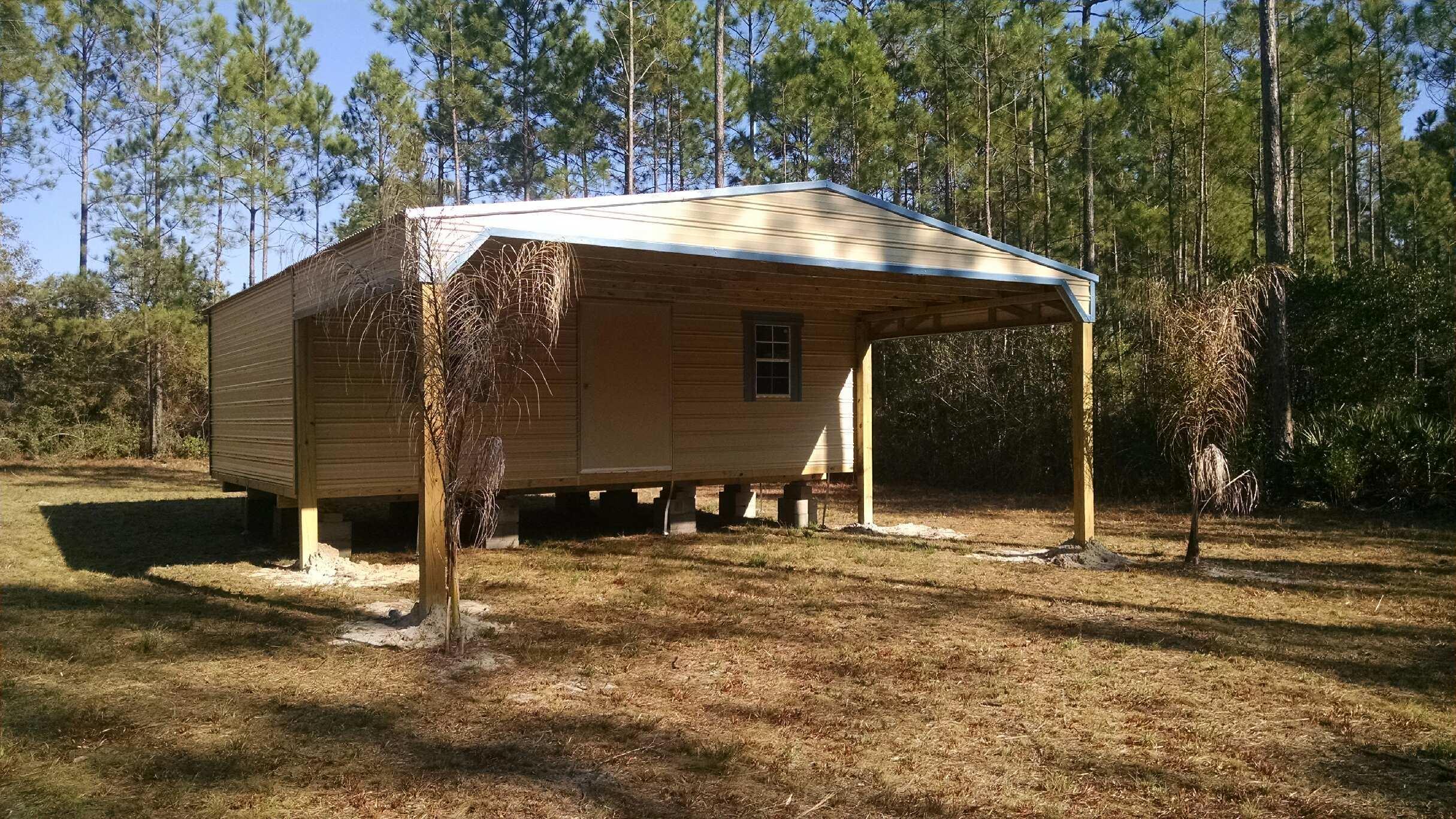 Large lot ready to build on. Thee is a structure on the property that is included in the price. It has pluming and electrical already ran to it.