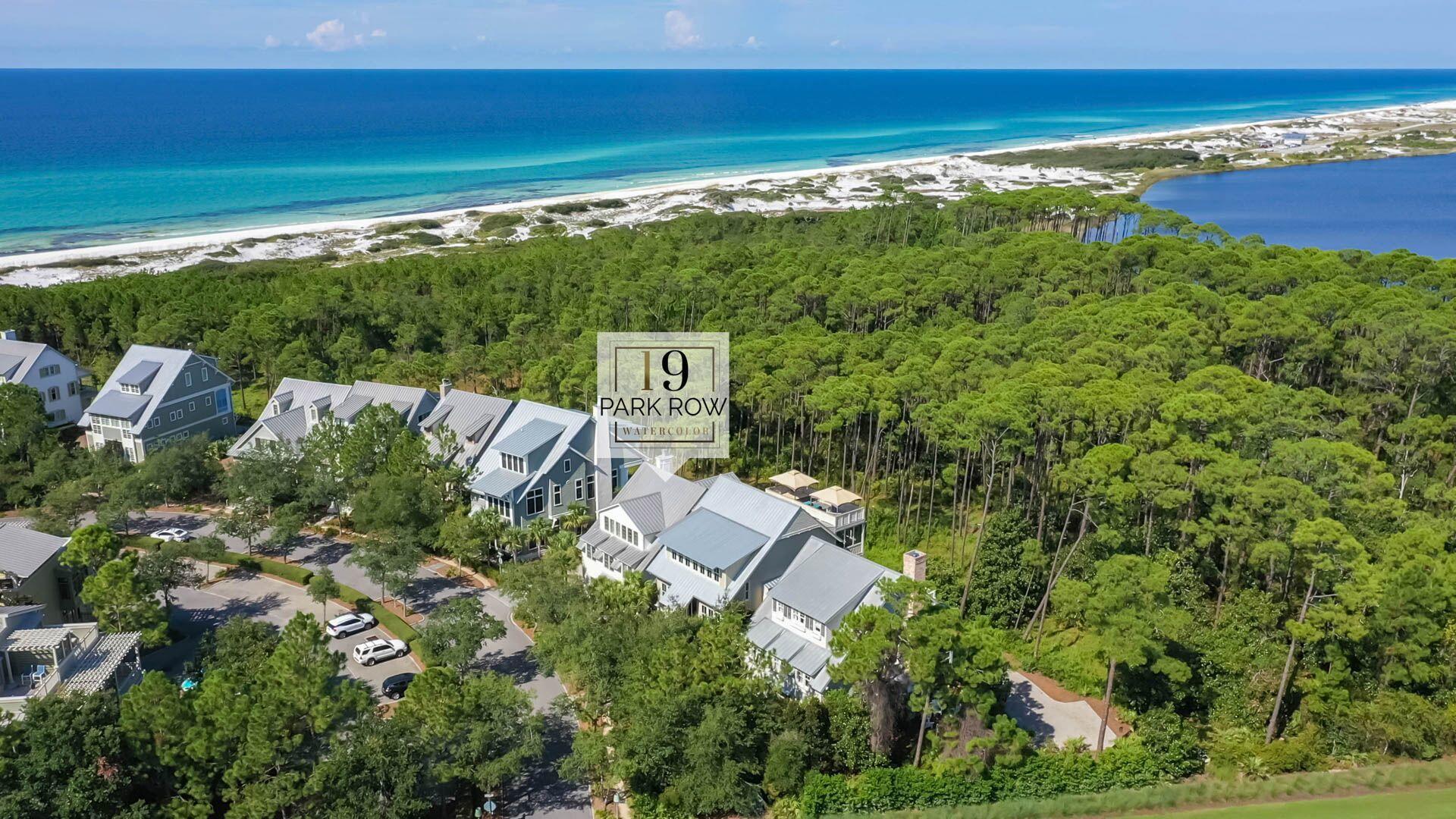 Located south of 30A on the exclusive Park Row of the WaterColor Resort, this stunning 6 bedroom, 5.5 bath residence offers views of 30A's iconic Western Lake. Featuring a classic coastal chic style, this three-story home with elevator and two-car garage was expertly designed to comfortably accommodate a crowd, maximize views and add both luxury and convenience to beach life. Notice standout finishes throughout, including Pecky Cypress doors and kitchen cabinets, wire-brushed oak floors, 200-year-old hand-hewn ceiling beams, St. Pierre antiqued marble counters, ship-lap walls and much more. Gather around the fireplace in the open concept living and dining areas that lead to a spacious covered porch complete with a summer kitchen, television and peaceful lake views.