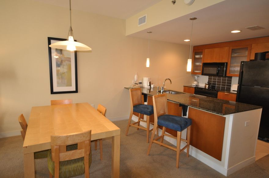 Lovely 3rd floor condo with a large, rounded patio overlooking the lush landscaping of the Grand Gardens. The kitchen is equipped with black granite counter tops, black appliances, and warm, brown cabinets giving the kitchen a welcoming modern look. This condo is fully furnished in a contemporary dcor. Enjoy bright, sunny days with large windows in the living area and bedroom. Bahia is located adjacent to the fabulous shopping, formal and informal dining and night life hot spots in the pedestrian Village of Baytowne Wharf. Owners also have access to the private Solstice Club, an amenity for owners and their guests, featuring grills, screened porch with gas fireplace, indoor bar, flat screen TV and comfortable seating inside and out.