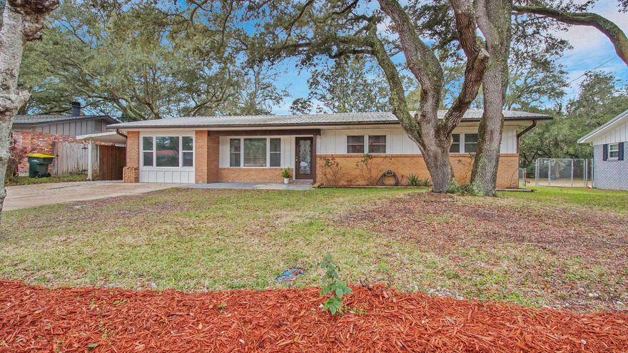 FULLY RENOVATED THREE BEDROOM HOME WITH GOURMET KITCHEN ON LARGE .27 LOT WITH FENCED IN BACKYARD.  If you're looking for a home that's move-in ready then look no further.  This home offer a chef's dream kitchen with stunning granite countertops, new cabinets, a kitchen island with built in KitchenAid Gas Range and wine fridge, high end KitchenAid double oven and Bosch dishwasher.   Enjoy your open living, dining, and kitchen area with plenty of large windows bringing in all the natural light.  You will find luxury vinyl plank flooring throughout the home and newly added square footage in the living room and master bedroom included in the recent renovation.  The master bedroom is a must see with sliding barn doors, spacious walk in closet, and additional space for a seating area.