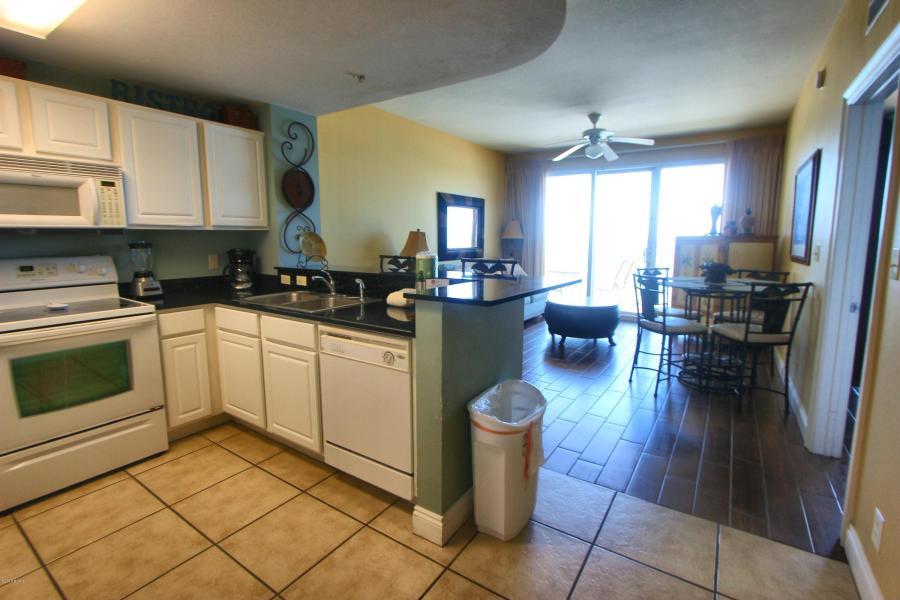 Calypso Resort and Towers boasts the best location on Panama City Beach, located adjacent to Pier Park. This desirable low floor one bedroom unit has a Master Suite and Great room located directly on the Gulf of Mexico. Both have access to the oversized balcony, which is why this floor plan has the best potential for rental income. This property is tiled through-out and conveys fully furnished and rental ready. Calypso amenities include; two pools, tiki bar, tropical landscaping, fitness center, covered parking and on-site security and rental management. All room dimensions are approximate and should be verified if important.