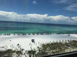 BEAUTIFUL UPDATED GULF FRONT CONDO.No rental less than 3 months at TGM. This condo has been completely remodeled and is FABULOUS All floors are tiled with 20x20'' ceramic tile laid on a 45 degree angle. The gulf front living room has crown molding & indirect lighting, new sectional sofa, TV stand with 55'' flat screen TV with sound bar & blue ray DVD player. Custom drapes in Master & Living area. Master Bedroom with amazing views from the floor to ceiling 12 foot wide windows overlooking the Gulf. 2nd bedroom has 2 queen size beds. Kitchen has been remodeled & opened up, with new cabinets, granite, backsplash, lighting and all new stainless appliances. Both bathrooms totally remodeled with granite vanities,custom tile shower, sinks, lights & mirrors. All ceilings were scraped & textured