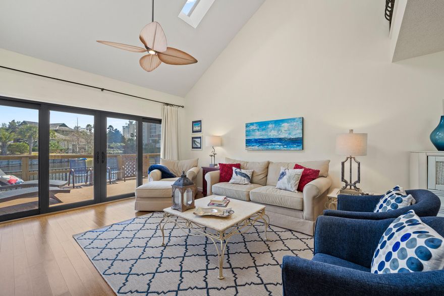 What a spectacular view from this end unit, 3 bedroom lakefront villa within Beachwalk Villas.  Located on the southside of Sandestin, a short distance to the community pool and beach. Fully furnished, capable of being a full time residence, 2nd home or investment property.  A flexible floor plan with 2 first floor bedrooms, open kitchen, dining and living room with vaulted ceiling. The 2nd floor has a large master bedroom with a private balcony, an open loft area/2nd tv room with pullout sleeper sofas and a bonus room, bunk room or home office. An expansive deck, with trex decking and 10 ft umbrella, overlooks the fountain and lake. The home is located at the end of a quiet cul de sac, just a golf cart or bike ride from all of the Sandestin amenities. Don't miss this one, it won't last