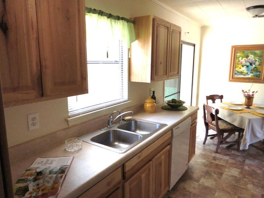 CENTRAL FORT WALTON BEACH--Recently updated! The owner has replaced or updated almost everything in the entire home within the last few years: lighting, flooring, some bathroom fixtures and the vanities. The all new kitchen cabinets are beautiful! The easy care flooring in the kitchen is both stylish and strong. The house is convenient to shopping, bases and schools and is move in ready. Great first time buyer property or this would be a solid investor property to hold as a rental.