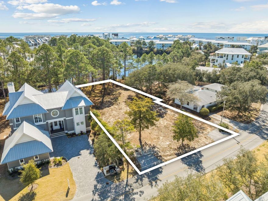 Tucked within the charming neighborhood of Eastern Lake Estates, south of Scenic Highway 30A and overlooking Tresca Lake, this homesite offers a rare opportunity to build in one of Seagrove Beach's most peaceful and naturally beautiful settings. Spanning approximately 0.3 acres with nearly 70 feet of frontage along a serene coastal lake, the lot enjoys tranquil views, added privacy, and a protected natural backdrop that enhances the sense of space and calm. Surrounded by a beautiful blend of mature trees, classic Old Florida charm, and stunning new construction, the setting perfectly captures the character that makes this pocket of Seagrove so desirable.  With a generous footprint, there is ample room to design a custom residence with outdoor living, a pool, and thoughtful orientation toward the water and peaceful scenic views. Two public beach accesses are just a short stroll away, making it easy to enjoy the white sand, emerald waters, and the rare serenity of Eastern Lakeone of 30A's treasured coastal dune lakes known for paddleboarding, kayaking, fishing, and its unique connection to the Gulf. Just nearby, Eastern Lake's county park offers a boat launch and dock for small motorized boats, kayaks, and paddleboards, providing effortless access to the lake from both the park and the beach. With no HOA and popular local favorites like Old Florida Fish House, Beachy Bean Coffee Co., and The Big Chill all close by, this homesite combines natural beauty, convenience, and strong investment potential in an exceptional south-of-30A location.