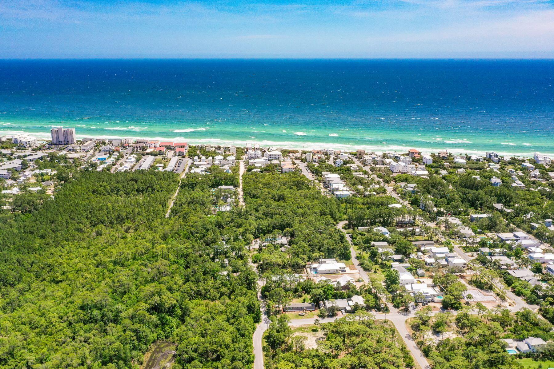 This private wooded homesite is located in the desirable neighborhood of Gulf Shore Manor in Seagrove Beach just off of Scenic Highway 30A with no mandatory HOA. Highly sought-after deeded beach access as well as three additional public beach accesses are just a short walk or bike ride away. There is no shortage of activities with the shops and restaurants of Seaside in close proximity. This lot is perfectly situated to build an income producing vacation rental, second home or private full time residence.