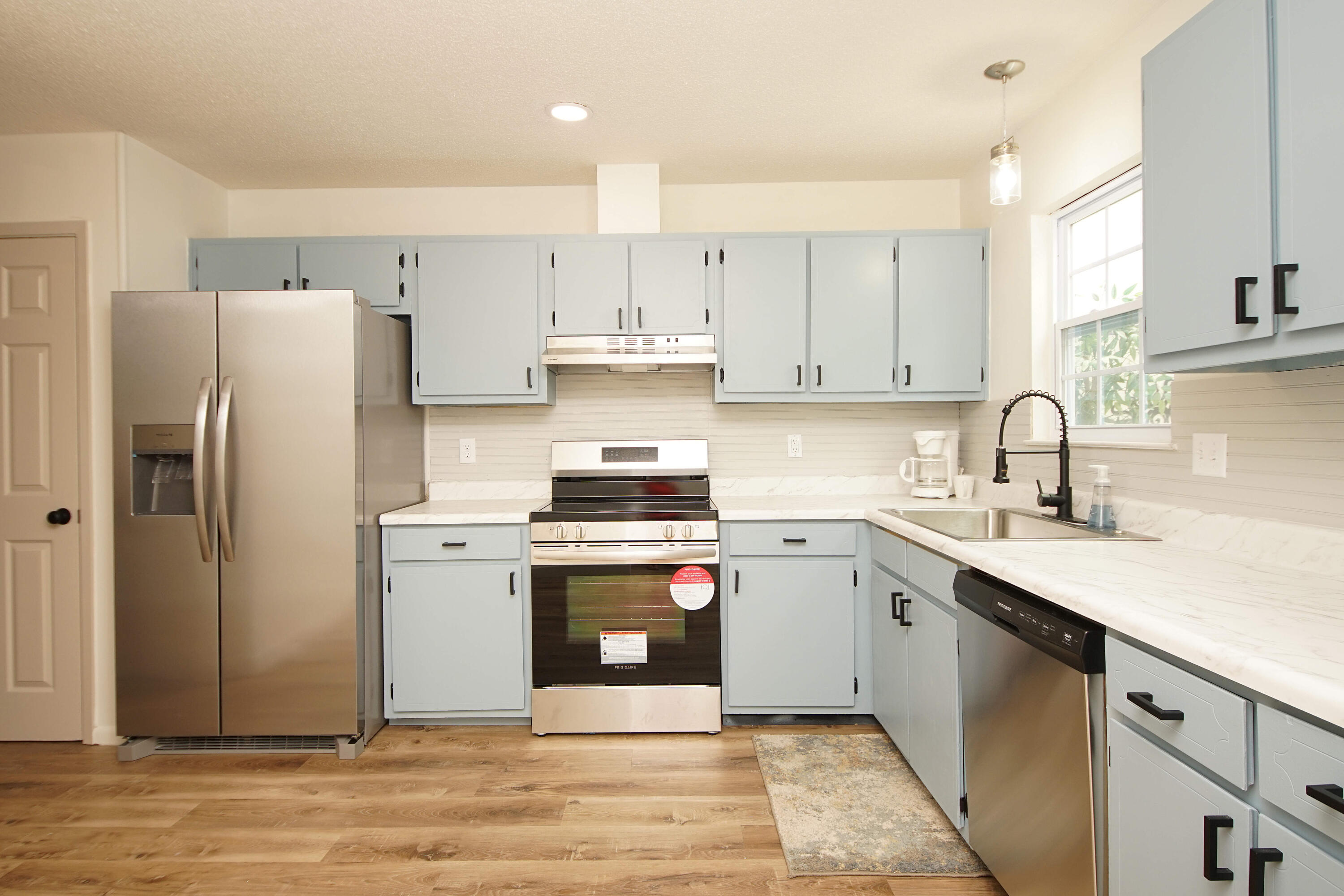 Welcome home to this renovated 3 bedroom 2.5 bath townhouse with a one car garage located in Shalimar, Fl. Just minutes from Eglin AFB, restaurants and the Choctawhatchee Bay, this is the perfect home for your family. All new LVP flooring, new carpet, new lighting, fresh paint and much more through out the home make it move in ready. The large family room has a new gorgeous stone electric fireplace as a focal point. The spacious kitchen has been updated as well with new stainless steel appliances, new counter tops and more. All three bathrooms have been completed remodeled with all new fixtures and lightening to continue the beautiful enhancements of this large townhome. Enjoy a morning cup of coffee in your quiet courtyard out front or the large sunroom out back. The large sunroom with a tile floor is perfect for relaxing and looking at your fenced in backyard.
All 3 bedrooms are on the second floor with 2 full bathrooms upstairs. The master bedroom has a large balcony for you to relax on in the evenings. Downstairs a half bath is conveniently located for your guest.
The large laundry room is located indoors of the sunroom. Make your appointment today to see this beautifully updated townhome in Shalimar, FL.
Roof - 2018