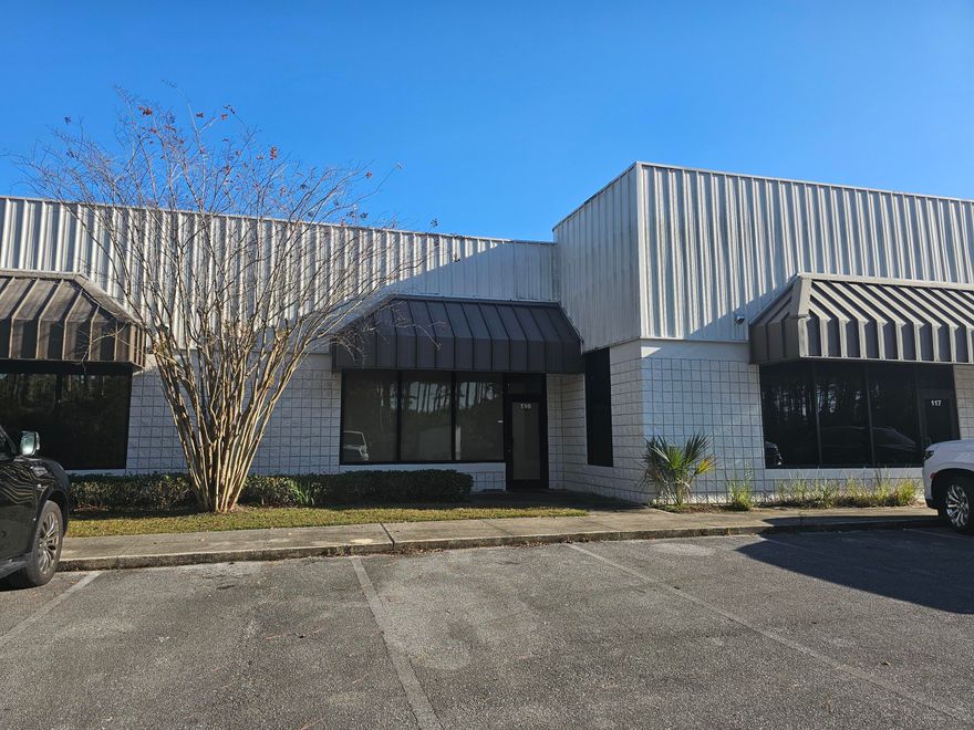 Ideal ''Man Cave'' for the Car enthusiast or small buisness owner. A prime 2,000 SF Office/Warehouse Condo ('Flex Space') now available for sale at 169 Griffin Boulevard, Unit B-116 in Panama City Beach, Florida. This versatile property has outstanding upgrades. The entire warehouse has AC installed, extra large grade level 12x12 door, assemetric car lift, built in cabinets and workbench, shared dock-height truck well and vinyl flooring.  The condo features a well-designed layout with +/-700 Sq. Ft. of office space and 1,300 Sq. Ft. of warehouse/shop/storage space.