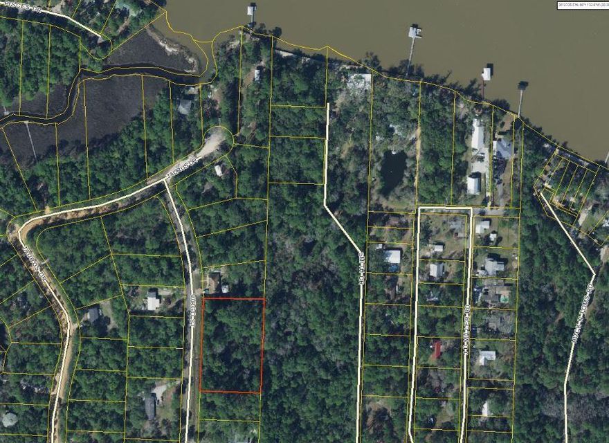 Great Property just steps from the Bay. This is three individually platted lots. The middle lot has some great natural features. There is no development to the east, so the lots provide some extreme privacy and serenity. Build your dream home or add rental properties for investment/retirement income.