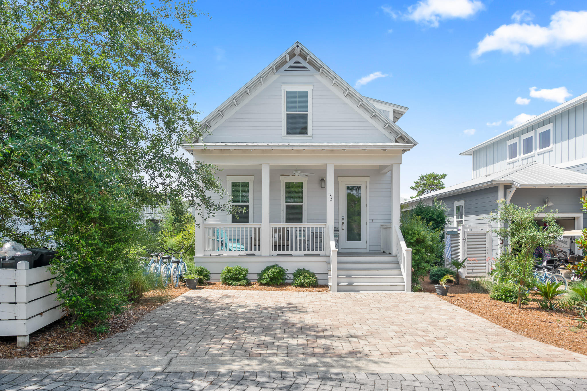 Welcome to 82 Gulfview Way! This adorable Florida Cottage is the ''Seaside'' floor plan, in the amazing community of Highland Parks in Blue Mountain Beach. This floor offers one bedroom downstairs, a open designed living area, the other bedrooms on the second floor and both levels have laundry rooms. This fantastic neighborhood is surrounded by the state forest, and within 1 mile to all three public beach accesses. Highland Parks is situated at the highest peak of 30a, providing the best views as well as easy access to the best restaurants, shopping and nightlife that 30a has to offer. This fantastic home features three bedrooms, three bathrooms and a large front porch. Enjoy the low HOA fees as well- a rarity for 30a!