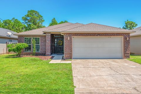 Photo of 2222 Pawnee Drive, Navarre, FL 32566 (MLS # 984676)