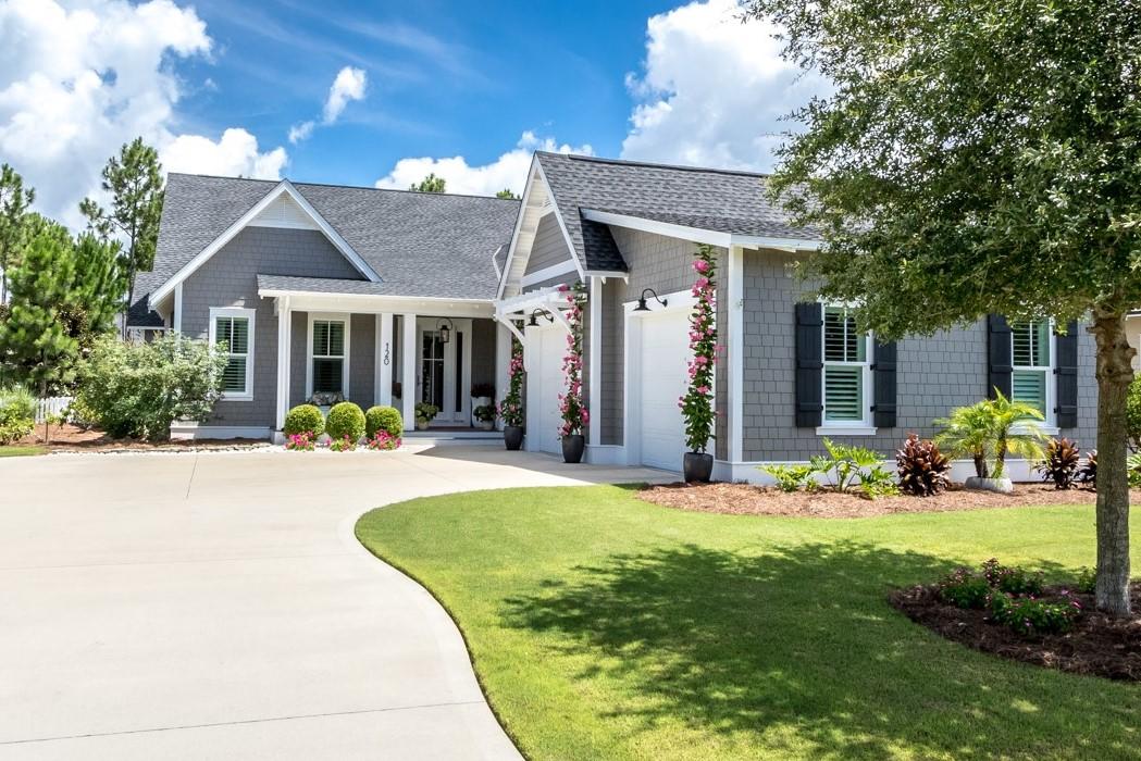 This beautiful 4 Bedroom home is situated on a premium homesite in Watersound Origins. Meticulously maintained both inside and out, this exceptional home features wood flooring throughout and a chef's kitchen with oversized island, cabinetry to the ceiling, Wolf & Sub-Zero appliances and a walk-in pantry. The spacious open concept living area is light and bright with abundant windows, a large living room area with v-groove wood walls and a lovely gas fireplace. The living area extends out to a generous screened porch with room for both an outdoor dining and living anchored by a beautiful Coquina shell outdoor fireplace. Enjoy the generously sized master bedroom with master bath and large walk-in closet.