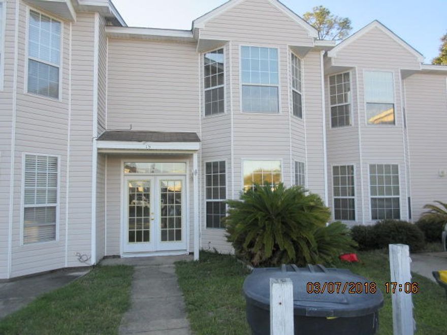 Spacious town home in central Fort Walton Beach. Convenient to beaches, shopping, both bases. Laminate wood flooring, carpet and tile. Bay windows upstairs and in up stairs master. 9 and 10 foot ceilings, walk in closets, covered patio and porch. 8x8 storage shed in small fenced backyard. And don't forget the underground utilities. Full bath next to downstairs bedroom! Don't miss this one!