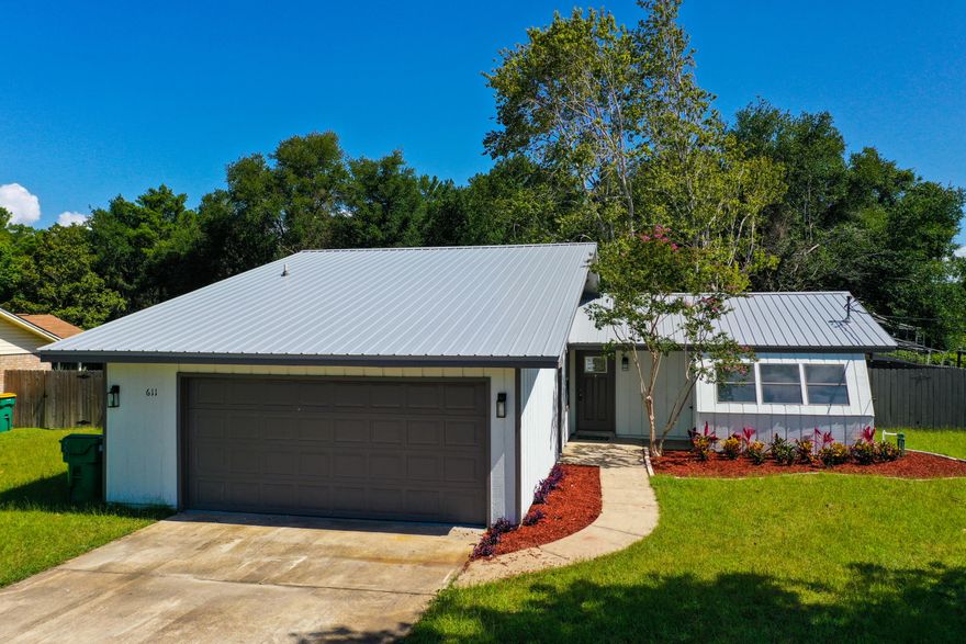 West Destin Remodel Under $340000! This adorable 2/2 has new metal roof, LVT Flooring, appliances, counters tops, paint, landscaping, sprinkler system/lawn pump, garage opener, lighting fixtures, doors and much more. Bathrooms have been totally redone along with kitchen upgrades. Huge backyard with privacy fence is great for family entertainment and would be ideal for a large swimming pool. Bonus room upstairs gives the home another bedroom if need be, however no closet. Split bedroom floor plan with 2 car garage and storage shed. Make your appointment today!