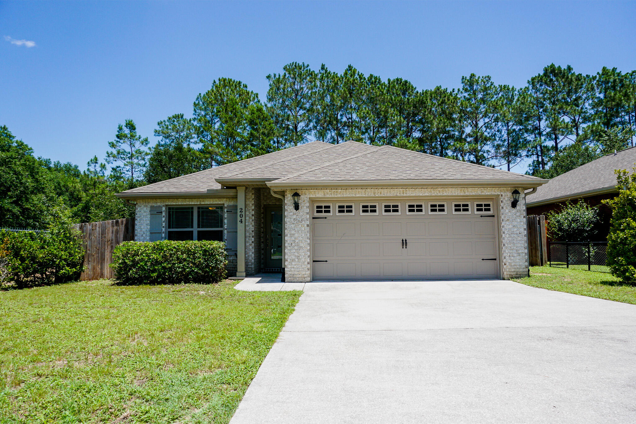 Available August 11th 2025. Welcome home to this well maintained corner lot home in Crestview! This home features granite countertops, stainless steel appliances, modern fixtures, accent walls, and a big open living room for entertaining. The master suite features a walk-in closet, tray ceiling, natural lighting, and en-suite bathroom. Take the party out back and and enjoy on the the beautiful pergola! Privacy fenced backyard. Close to shopping, bases, and beaches. Pets allowed with owner approval and $400 non-refundable pet fee. No inside smoking or vaping. Owner pays for Terminix service as a plus! AS IS washer/dryer. AS IS Irrigation System. Apply with La Bella Vita today!