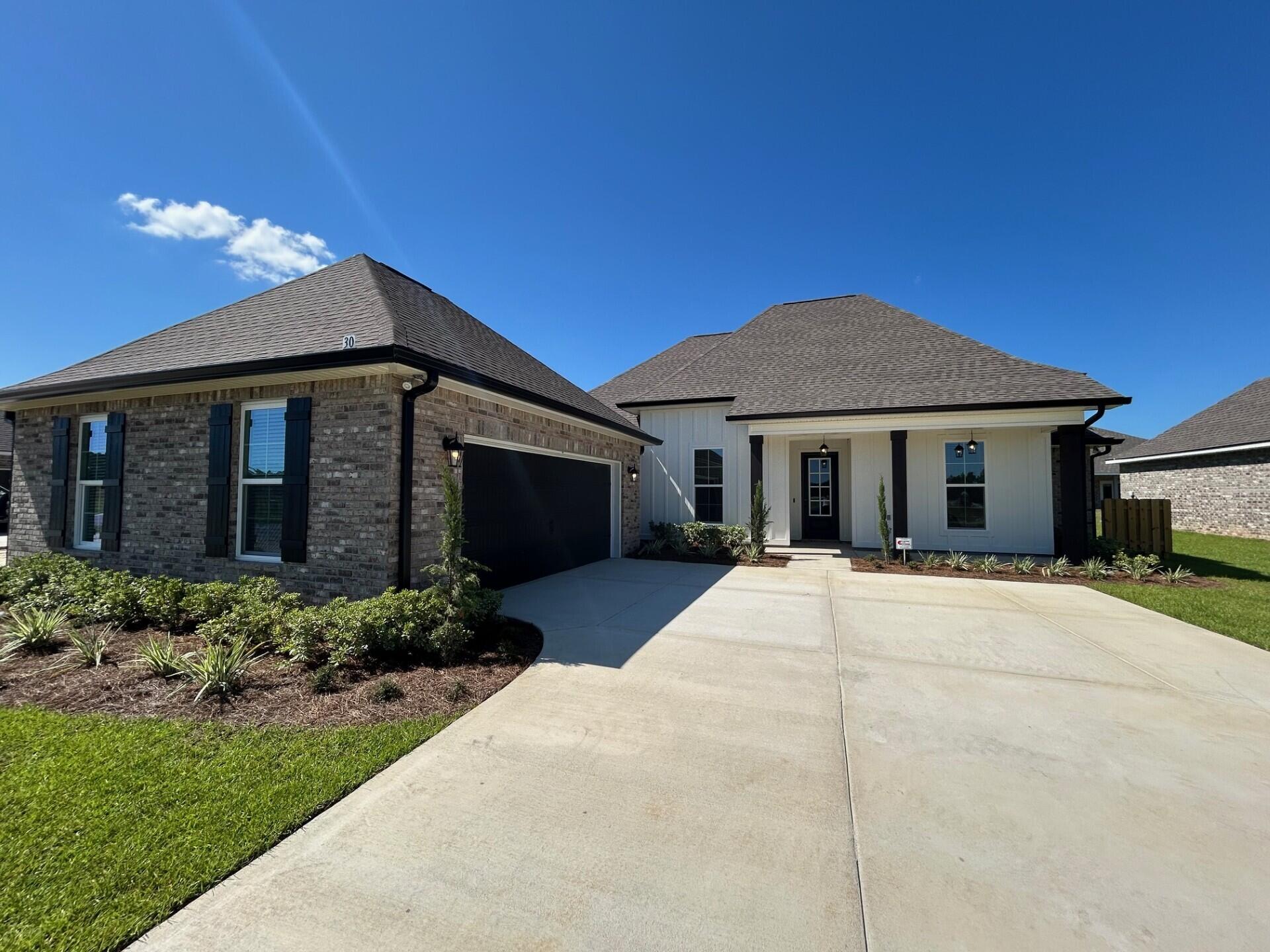 The RENOIR IV I in Natureview community offers a 4 bedroom, 3 bathroom, open design with flex space and breakfast area. Upgrades added (list attached). Special Features: double vanity, garden tub, separate custom tiled shower, and walk-in closet in master bath, kitchen island, walk-in pantry, boot bench and drop zone in mudroom, covered porches, custom kitchen backsplash, crown molding, ceiling fans in living and master, framed mirrors in all baths, smart connect WIFI thermostat, smoke and carbon monoxide detectors, landscaping, architectural 30-year shingles, flood lights, and more!Energy Efficient Features: water heater, electric kitchen appliance package, vinyl low E windows, and more! Energy Star Partner.