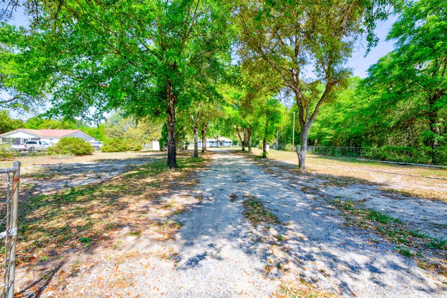 Welcome to this beautifully updated 3 bedroom, 2 bathroom home with an attached garage. This large home-site is fully fenced with an electronic gate. Enjoy the peaceful charm of country living with the convenience of nearby amenities. The property features a greenhouse, climate-controlled storage, and plenty of space to spread out. Updates include fresh exterior paint, sleek countertops, and stainless steel appliances. The primary bathroom offers a walk-in shower and a classic clawfoot tub--ideal for unwinding. This move-in ready home offers comfort, style, and room to grow. Schedule your showing today.