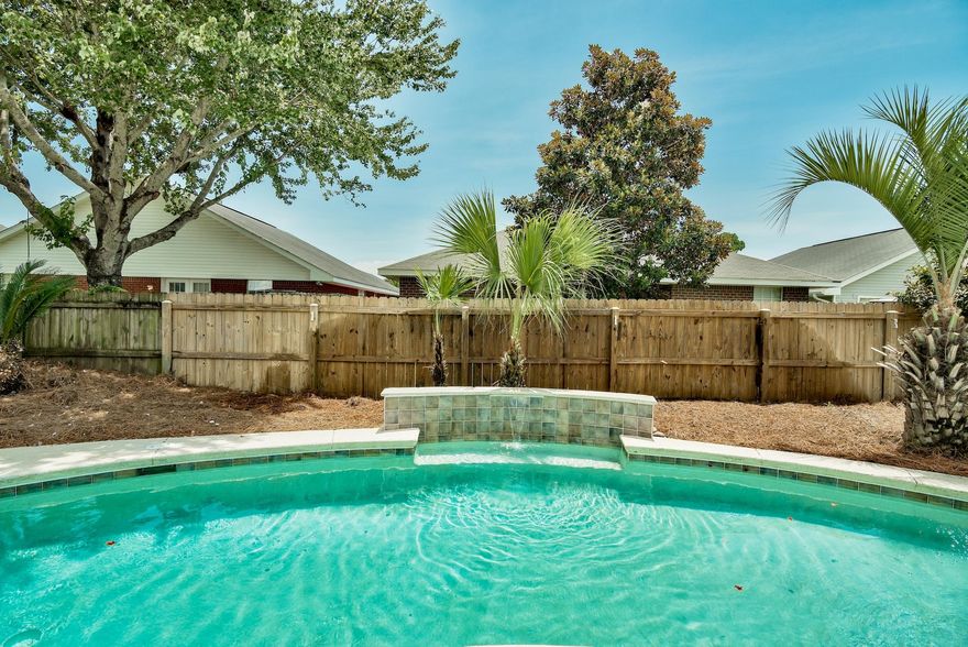 Opportunity Knocks in Desirable Emerald Village! BEST PRICED HOME IN THE COMMUNITY & THE ONLY ONE on the Market with a POOL!!!! Beautifully Updated One Story Home with 2 Car Garage & 3 Split-Bedroom Plan & 2 Bathrooms. The sellers have recently done countless UPDATES & UPGRADES to have this home completely Move-In Ready for You!!! Painted, New Stainless Steel Appliances, Granite Countertops, Sinks, Fixtures, Some New Lighting, New Plank Wood Laminate Flooring & New Carpet, & updated Landscaping... the list goes on! This home offers a peaceful environment with a fresh color pallet of whites and blue-grays! Looking for outdoor relaxation & fun, Step outside to Your Own Beautiful Pool Oasis with Waterfall Feature Wall! Centrally Located Close to Military Bases, Schools, Shopping & Dining!!!