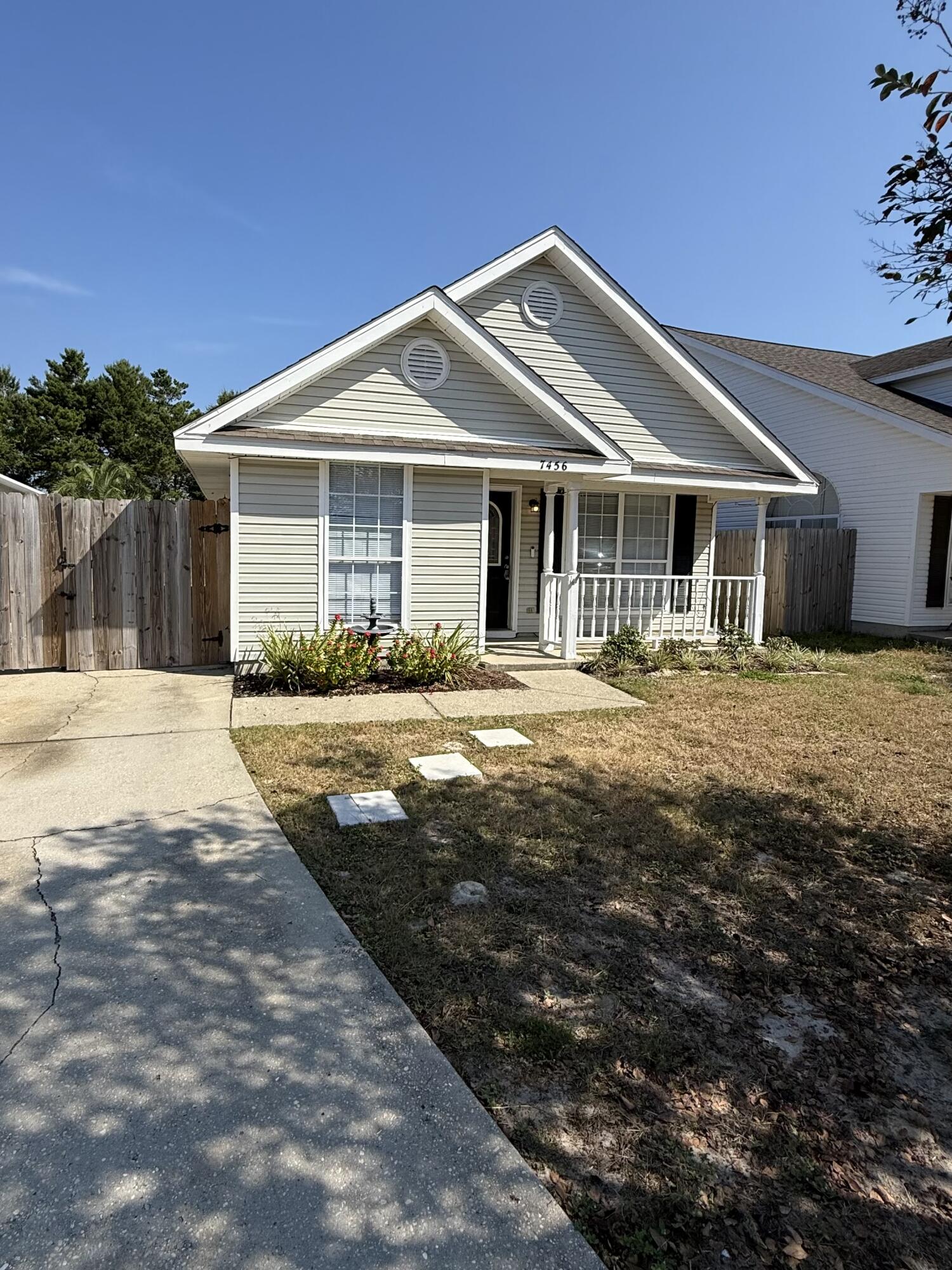 This quaint cottage style home is centrally located in the heart of Navarre, FL. It is just minutes from Navarre Beach and just east of Hurlburt Field. There is tile in the main living area as well as new LVP flooring in the bedrooms. There is a front porch, privacy fenced backyard with a back patio area as well as walk-in laundry room.