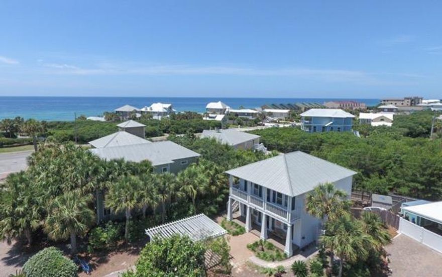 Completely Renovated beach retreat along the East end of 30A with deeded beach access located in the 6 home community of Tranquil Shores. New decor and fully furnished with coastal accents is your turn-key retreat just a tenth of a mile to the beach! Reverse plan offers a top floor w/newly designed open living/kitchen & dining area with all new cabinetry, quartz & granite countertops, all wood walls, island & built-in bench. The newly configured spacious master bath offers a walk-in closet, walk in shower and dual vanities. Two additional guest rooms with ensuite baths and a second living w/ built-in bunks for the kids! Shiplap walls and barn doors add to the beautiful new design & decor. Sunny side porch off master bedroom leads down to rear porch & patio area. Over 700 sq ft. of