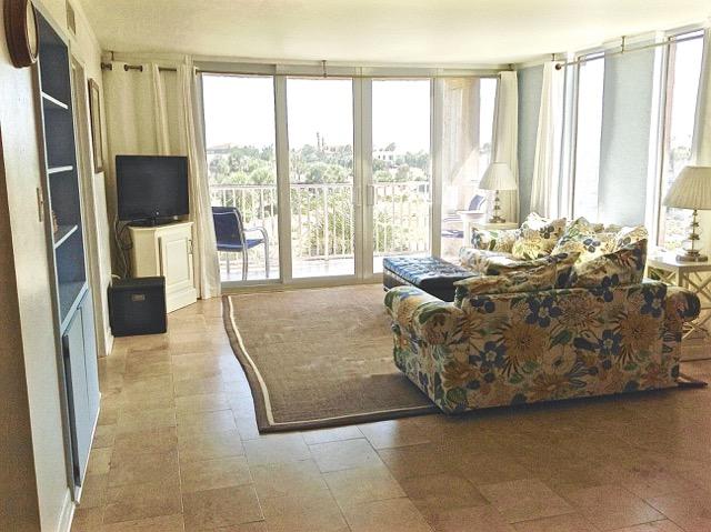 Dolphin Point Condos are located right on the happening Destin Harbor, and also provide a coded, gated beach access to Holiday Isle Beach just a short stroll away. Additionally, there is a beach on the harbor side just for Dolphin Point residents. Other Dolphin Point amenities include a boat dock, beautiful pool with pool house, tennis courts and shuffleboard overlooking the harbor, and outside grills for each building. Unit 306A in Dolphin Point affords you all the exciting Harbor waterfront action, if you want to participate, and yet it provides privacy if you prefer to just relax and enjoy the scenery. Recent renovations to this quiet end unit include stainless steel kitchen appliances, custom wormwood maple cabinets, and granite counter tops. The condo has updated doors