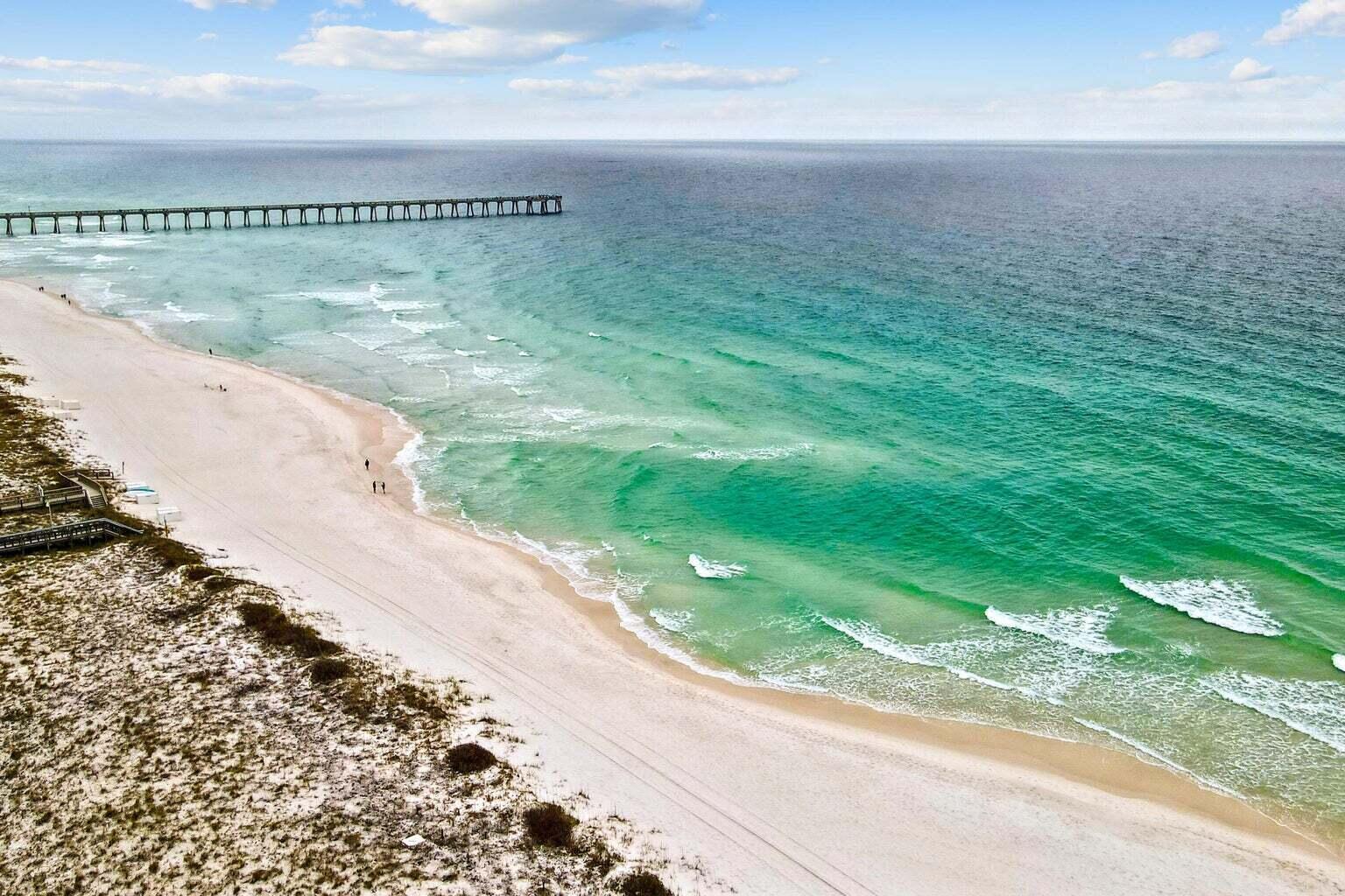 Gorgeous GULF VIEWS from your balconies on Navarre Beach is a fantastic place to relax and enjoy the coastal scenery. Navarre Beach is known for its pristine white sands and beautiful Gulf of Mexico views, making it a popular destination for beach lovers. This three-story townhouse with several expansive balconies provides plenty of space to enjoy the outdoor ambiance and soak in the sights and sounds of the Gulf of Mexico. The townhomes main living areas are on the second floor with balconies on off the living room and kitchen. A full bathroom is also located on the second floor for your guest to enjoy. The third floor is home to both bedrooms and the master bath. Each bedroom has their own private balcony with the master bedroom balcony facing the beautiful Gulf of Mexico. The townhome comes fully furnished with brand new living room furniture included. Whether you're looking for a vacation rental or a permanent residence, a townhouse with direct Gulf views on Navarre Beach offers an ideal setting for relaxation and coastal living.

Roof- May 2023- 