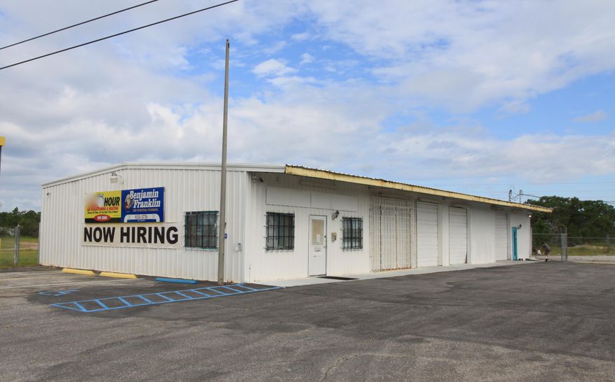 4000sf of Office/ Warehouse with great visibility in the Gulf Breeze- Tiger Point area. This building is divided into roughly 1600sf of office and 2400sf of warehouse space on 1.35+ acres with plenty of parking and gated storage yard. Automotive shop not allowed.