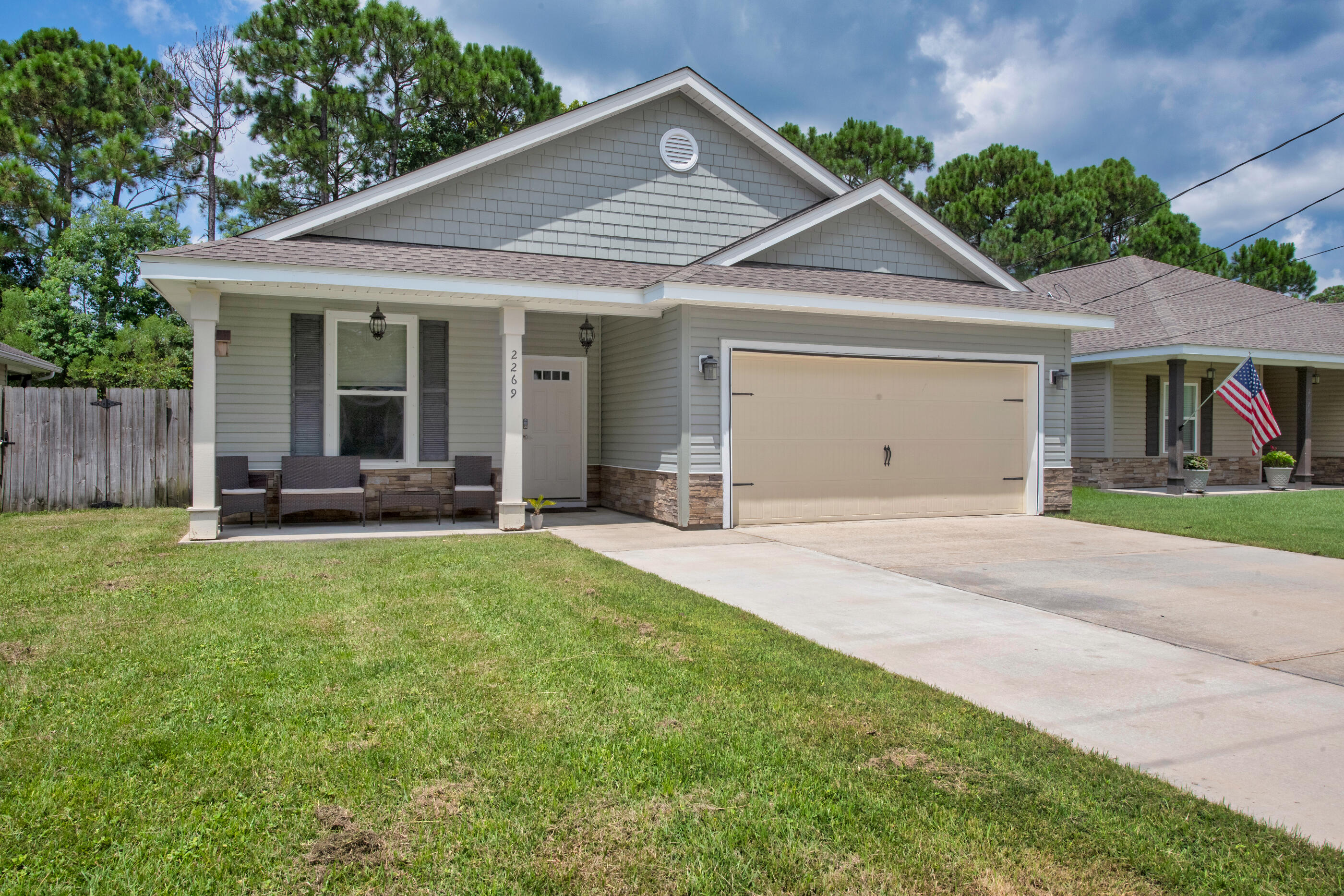 Your search is over! This home is sure to make you feel welcome as soon as you step into the hardwood floored foyer. To your left are two spare bedrooms and full size bathroom. The large open concept floor plan is just ahead, with high ceilings in the living room and direct views of the dining area and granite countered kitchen. The large walk in pantry will help ensure you never run out of space. Thru the laundry room you'll find access to your air conditioned garage, ready to use as a shop, gym or anything else you can imagine. The master bedroom sits at the rear of the home and features an ensuite bathroom and huge walk in closet. The back yard is perfect for entertaining with concrete slabs and grass on the side for pets. Located just 13 mins from Hurlbrt Fld and 10 mins to the beach.