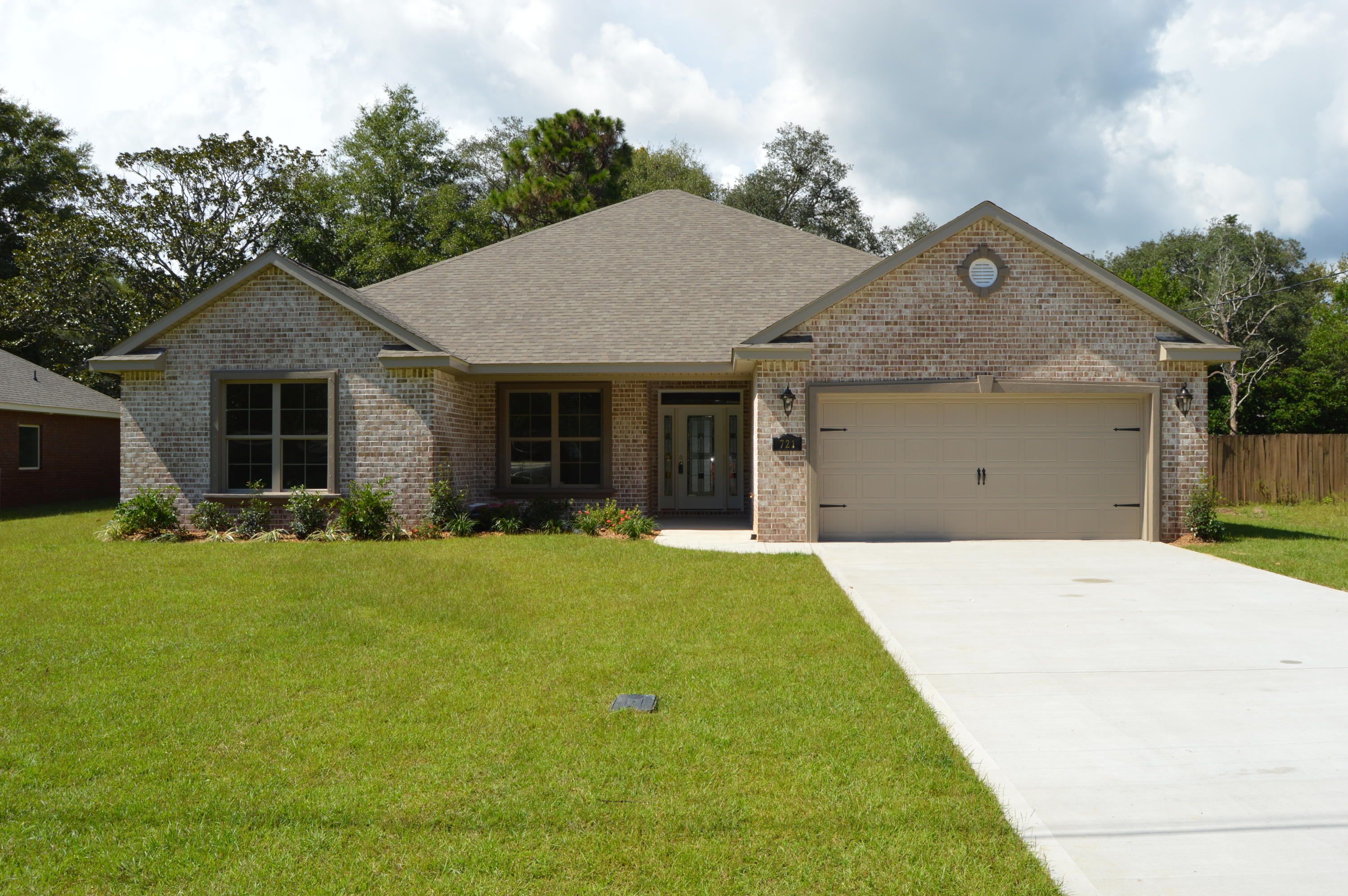 Be the first to live in this beautiful, all brick home built in the beloved Kenwood subdivision by a local multi award winning VA Approved builder. This home, which sits on over a 1/4 acre lot, features 4 bedrooms and 2.5 baths. The master suite has a trey ceiling and a walk-in closet. Master bath has a double vanity, garden tub w/ separate shower. The kitchen comes with stainless steel appliances and granite countertops. The 20x20 living room with a double trey ceiling is perfect for entertaining. The yard will be completely landscaped to include a lawn pump and sprinkler system. You can enjoy the backyard from your 21x7 covered lanai.