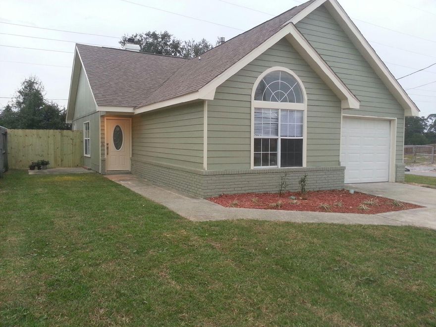 Beautiful fully remodeled property about two miles west of hurlburt. This property has been completely remodeled. House has all NEW fixtures, flooring, 6 panel doors,paint, and so much more. New kitchen with all new black appliances including fridge! LARGE OVERSIZED corner lot with new sod and fencing. Living room is filled with extras from new flooring and a beautiful fireplace. The bathrooms are light and bright with beautiful new fixtures. The master bedroom boasts vaulted ceilings, private on suite, and a large walk in closet. The laundry room is oversized with cabinets for storage. With a one car garage this property is everything a family can dream to have.