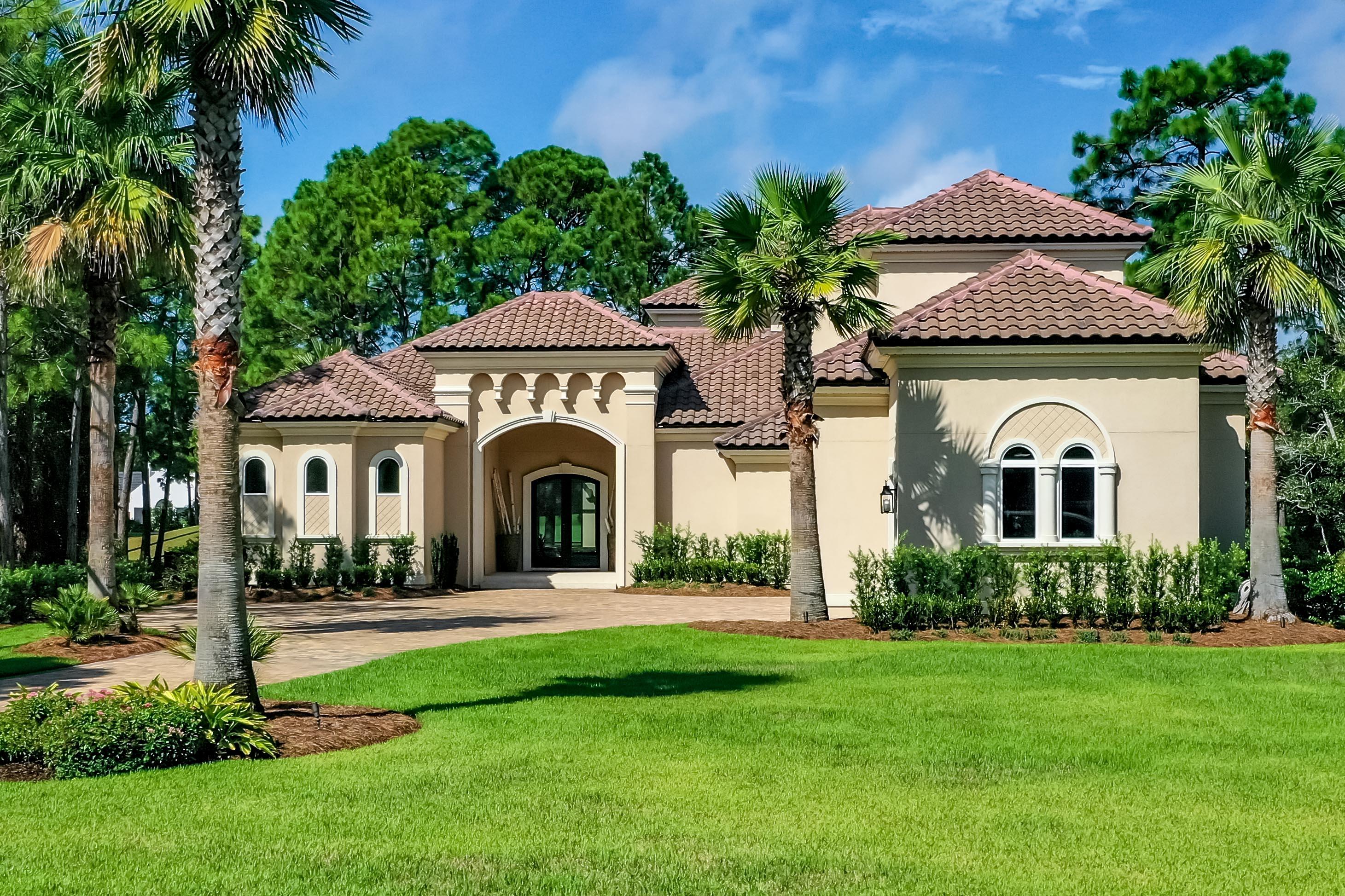 Experience the ultimate in resort-style living in this meticulously maintained custom built home. Located in the prestigious neighborhood of The Preserve at Burnt Pine, and situated on a beautiful lot, alongside the 4th fairway of the Burnt Pine Golf Course. The owners named The Estate - The Sanctuary @Sandestin and you'll see why when you pull up day or night to the lavishly landscaped and beautifully lit surroundings. One of few 60 foot plus estate driveways in Burnt Pine. This home was designed with outdoor entertaining in mind. Outdoor features include a spacious screened-in lanai, equipped with a Bluetooth surround sound system, retractable screens, Mini split with 30,000 btu to offer comfort throughout the summer, all overlooking the